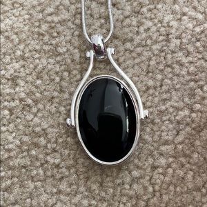 Pivoting pendant 34 inch silver plated necklace